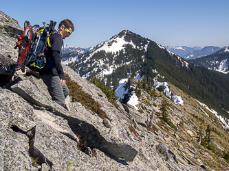 Descending the summit block.  Mount Defiance in the background.