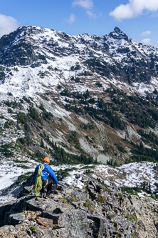 Descending the east ridge with Chikamin Peak in the background