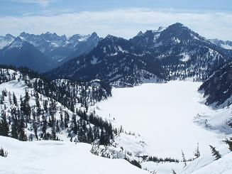 Middle Fork peaks, Avalanche Mountain, and Snoqualmie Mountain over Snow Lake