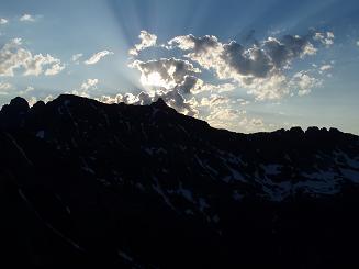 Sunrise behind Chikamin Peak from Alaska Mountain