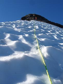 Descending frozen snow slope on Easy Ridge (NW of Easy Peak)