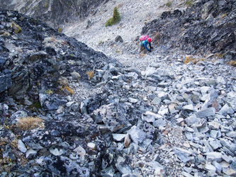 On the west side of Rollo, ascending a crummy gully that leads directly to the summit.