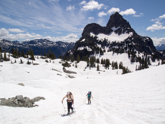 Skiing up to the Hyas Creek Glacier, with Cathedral Rock in the background.