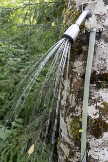 Random shower in the woods.  Perhaps installed by the owner of a nearby mining claim?