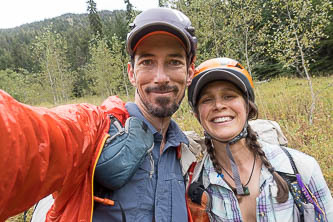 I don't know why we are smiling. We were wearing helmets because the wind was blowing trees down ALL AROUND US. We speed-walked all morning to get out of the forest and up into the alpine. Maybe we are smiling because we finally got to a meadow where we were safe from falling trees.