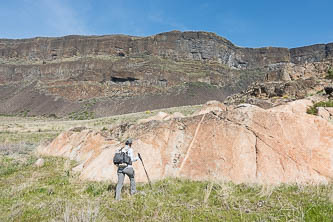 Basalt cliffs over a granite slab